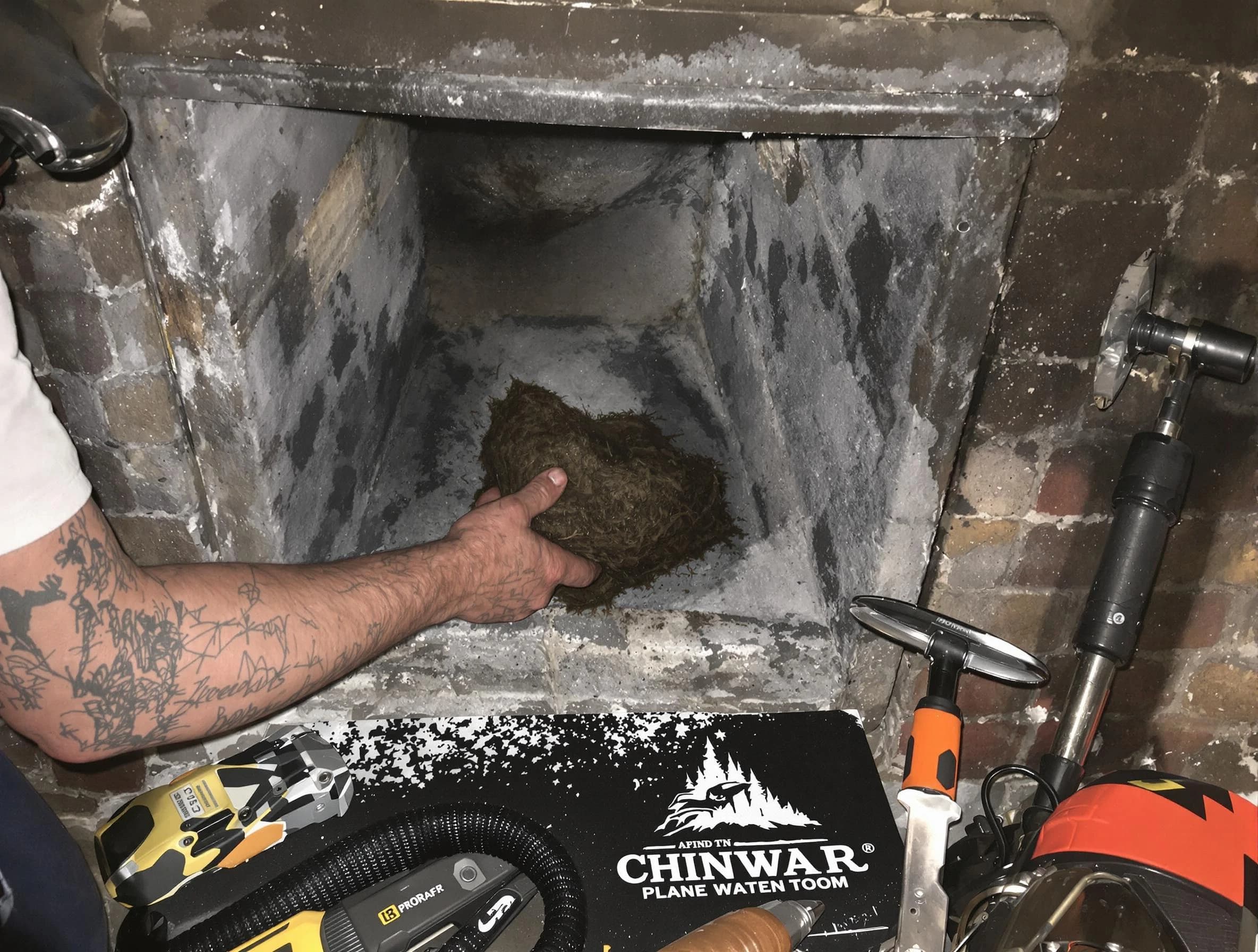 Piedmont Chimney Sweep safely removing debris and screening chimney in Piedmont, OK
